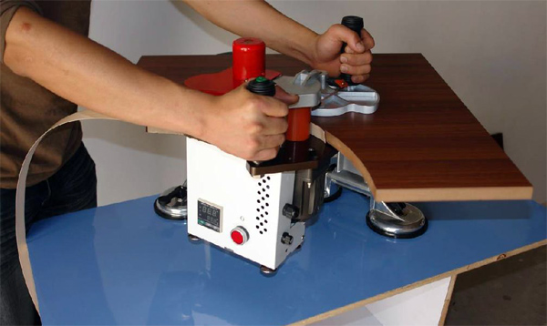 手工封邊機進行曲線封邊